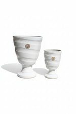 Load image into Gallery viewer, Botanical Elegance White Glazed Footed Urn - Set of 2

