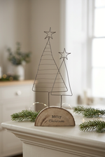 Load image into Gallery viewer, Double wire Christmas tree decoration styled on a mantelpiece with evergreen sprigs and warm fairy lights

