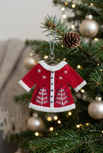 Load image into Gallery viewer, Embroidered red jacket ornament on a Christmas tree with warm festive lights
