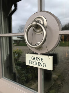 gone fishing door sign