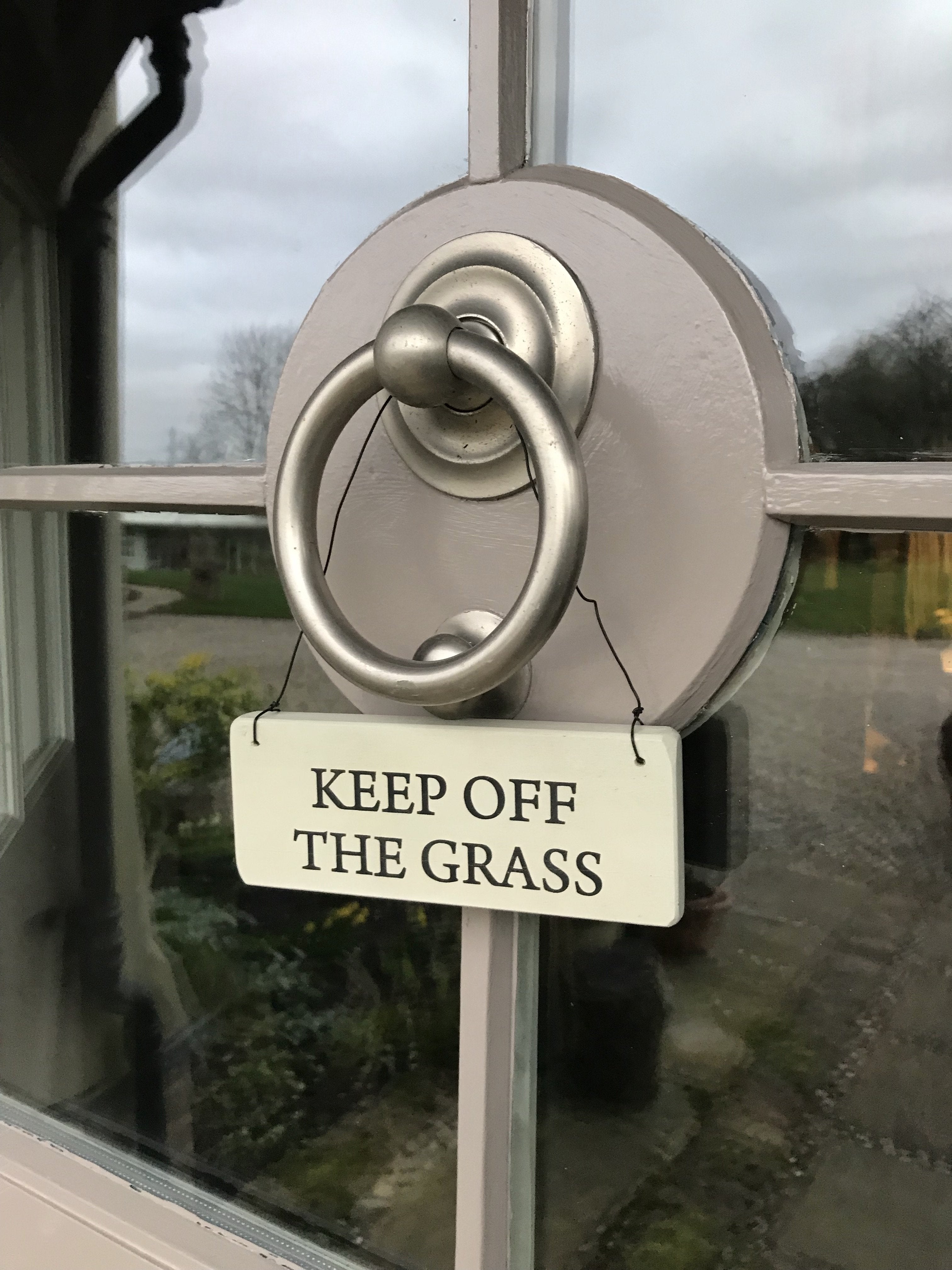 Keep Off The Grass Door Sign